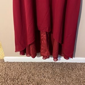 NWT formal dress high low burgundy dress. Adjustable straps